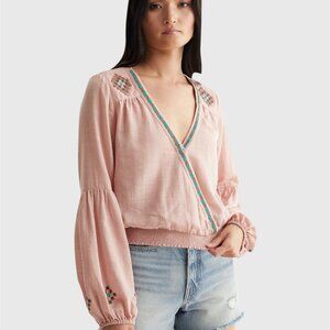 Lucky limited edition beaded surplice wrap top